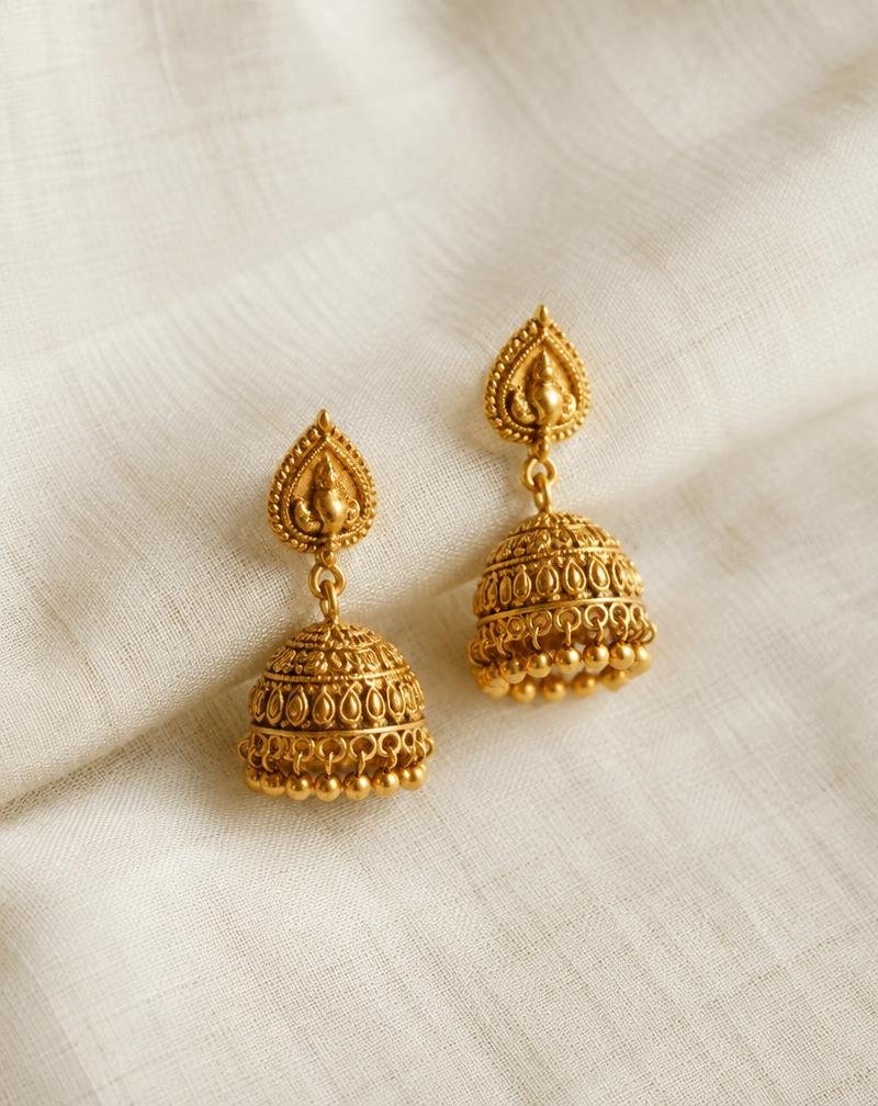 Gold jhumka earrings